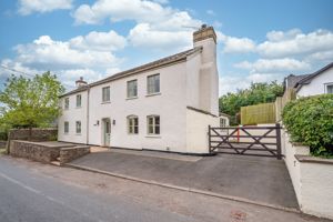 Front elevation and parking- click for photo gallery